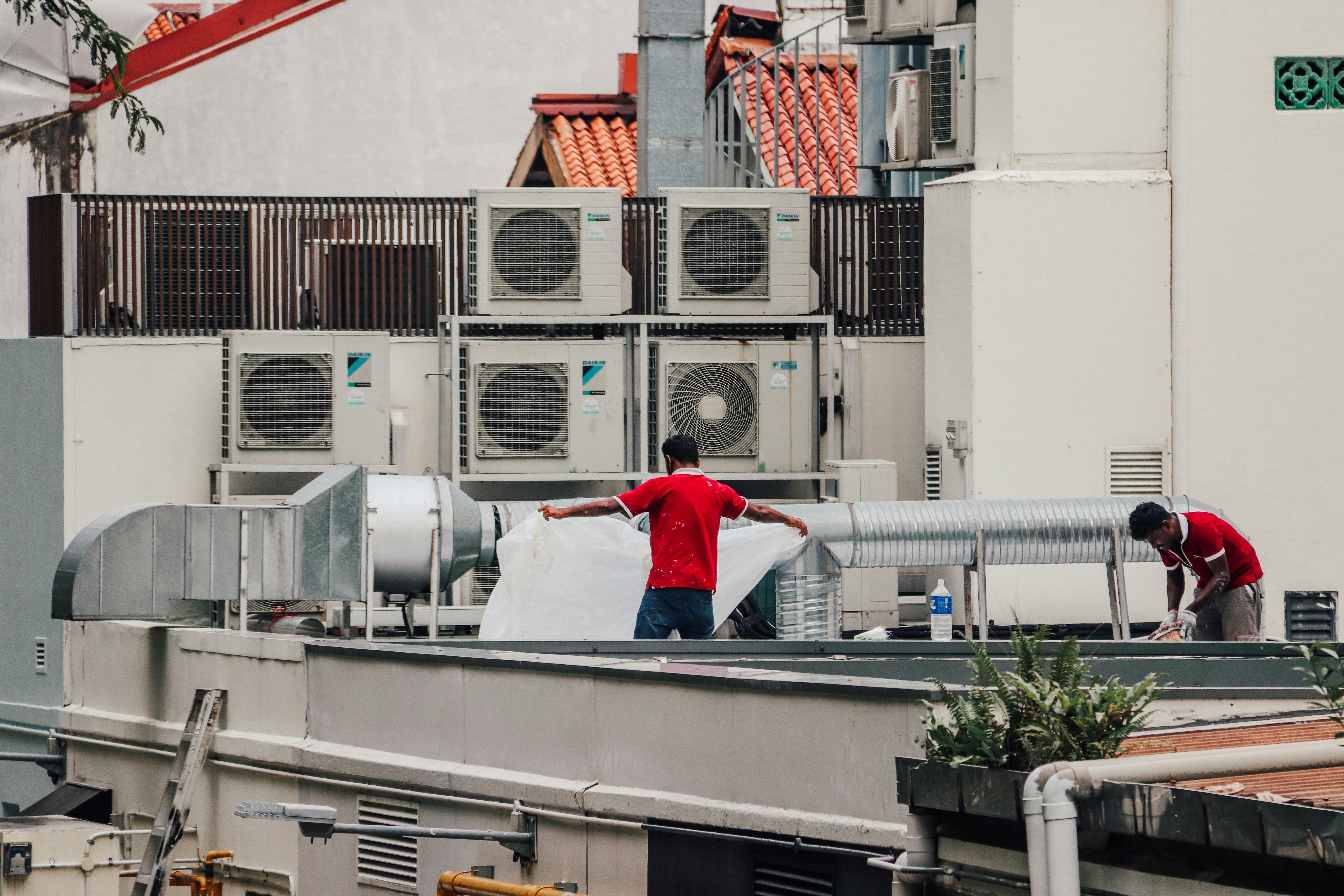 HVAC install crew on a commercial job site
